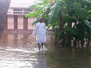 Ilayaraja Helps Flood Victims in Chennai Photos